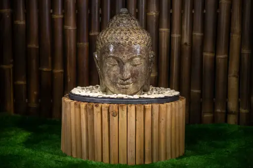Product image of the product “Buddha head as a water feature, 28x23x34cm, cast stone, hollow, handcrafted & coloured 30 cm”